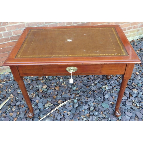 531 - A mahogany writing table with brown leather inset top, single drawer on turned legs with ball & claw... 