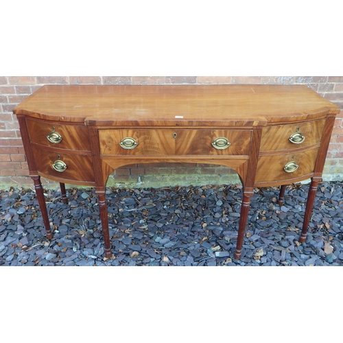 543 - A 19th cen mahogany breakfront sideboard on turned reeded legs, top cracked, 175cm wide, ex The Retr... 