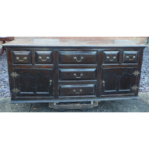 548 - A dark stained, panelled oak dresser base, some old timber used, 180cm wide, ex The Retreat (61)