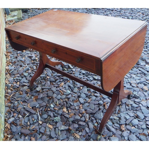 556 - An Edwardian mahogany sofa table, 95cm wide, closed, ex The Retreat (87)