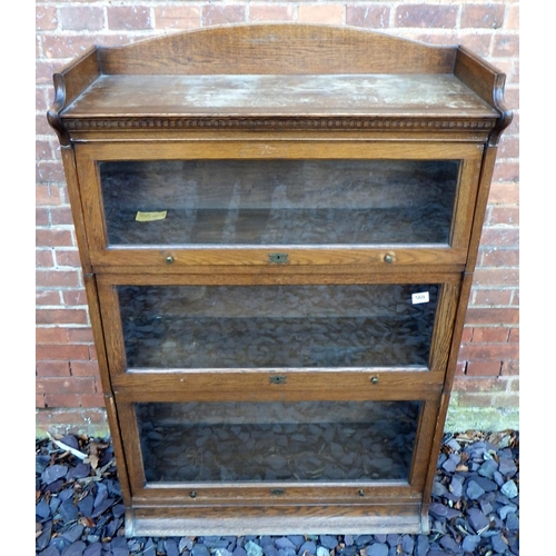 560 - A three section oak Lebus bookcase, ex The Retreat (109)