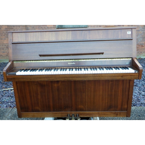 561 - A modern Baldwin upright piano, ex The Retreat (75)