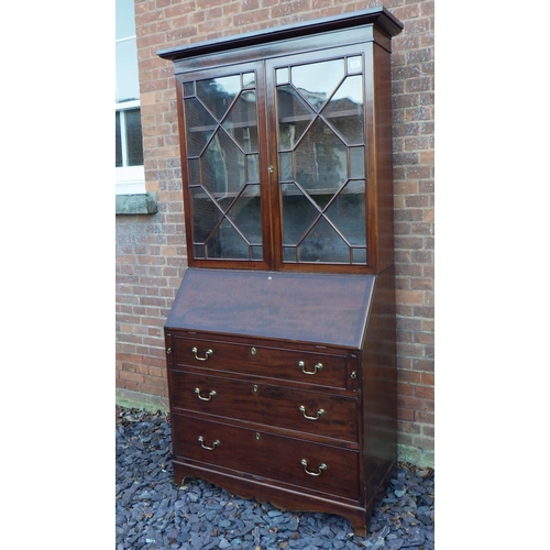 570 - A mahogany bureau bookcase, restored, cornice 112cm wide, ex The Retreat (19)