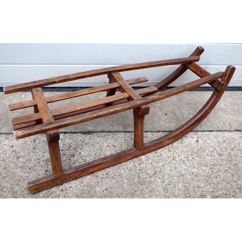 629 - A wooden sledge, (worm)