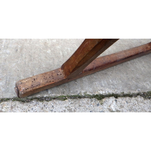 629 - A wooden sledge, (worm)