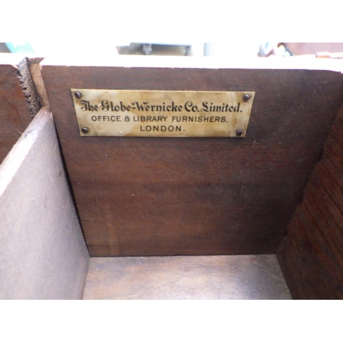 633 - A 1930's oak roll top desk, with label Globe Wernicke, 123cm wide