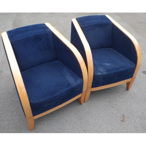 636 - A pair of modern easy chairs