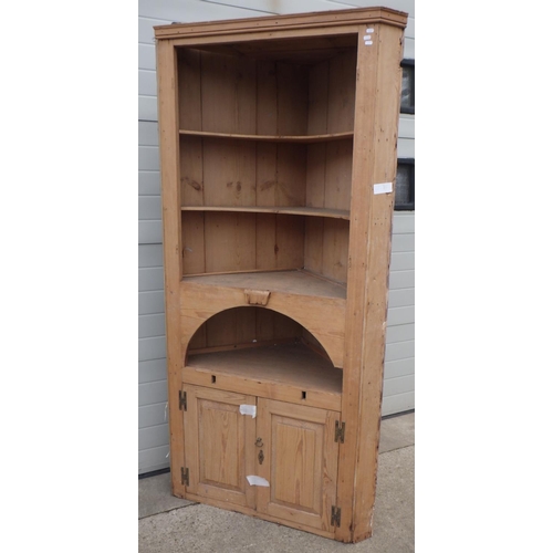 641 - A pine corner cupboard, a/f missing doors, 217cm tall