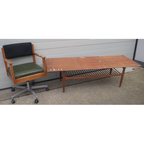 652 - A mid century teak coffee table together with a swivel office chair (2)