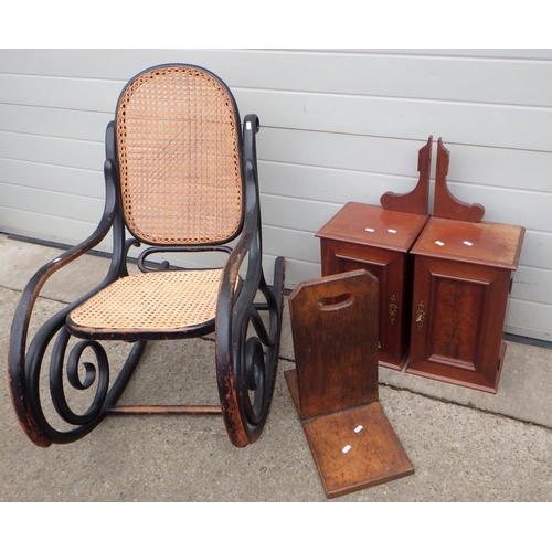 654 - An ebonised bentwood caned rocking chair together with a pair of dressing table top cupboards and wo... 