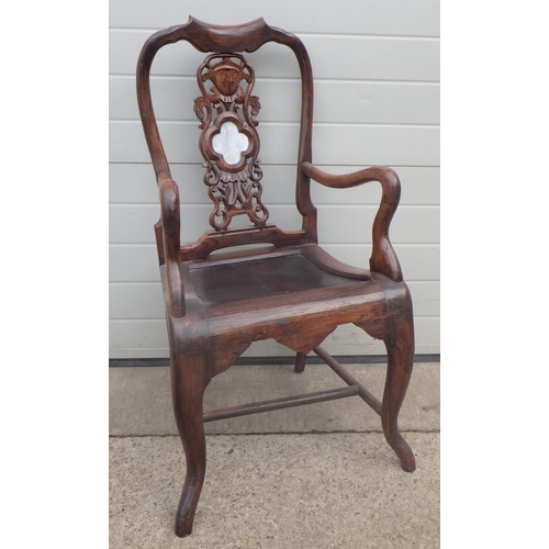 660 - An Eastern hardwood open armchair with marble inset splat, repair