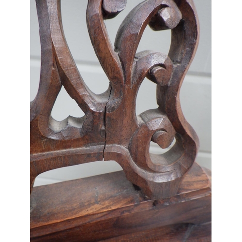 660 - An Eastern hardwood open armchair with marble inset splat, repair