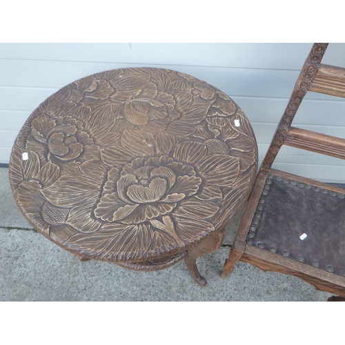 681 - A carved occasional table together with a side chair, old worm (2)