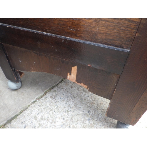 689 - A 1930's oak/ply sideboard together with a small wardrobe, some veneer damage (2)