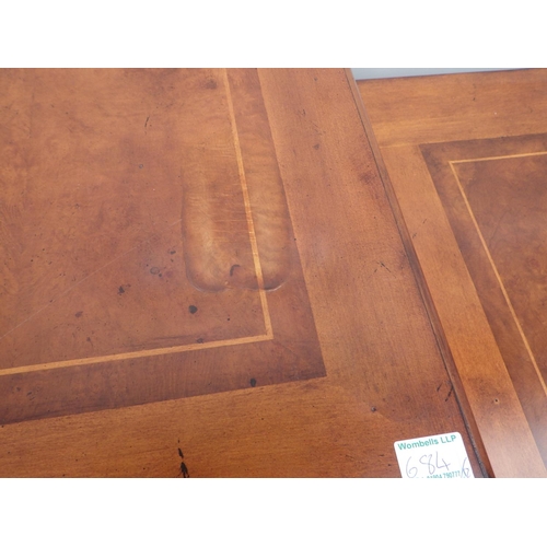 695 - A reproduction draw leaf dining table, 185cm long closed, 100cm wide, together with a matching sideb... 