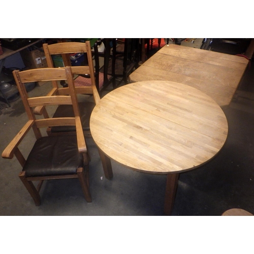 766 - A late Victorian oak dining table, missing castors, a/f, together with a circular modern dining tabl... 