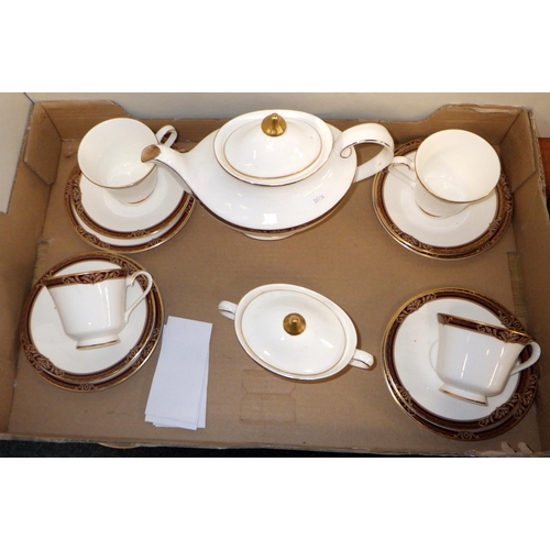 108 - A Royal Doulton Tennyson part tea service (stained) to include teapot, sugar bowl & 4 trio's