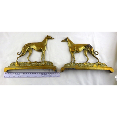 102 - A pair of early 20thC greyhound door stop together with brass Ally Sloper door stop (3)
412776 & 412... 