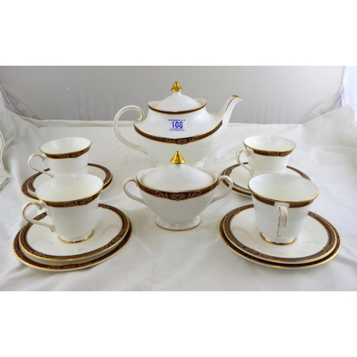 108 - A Royal Doulton Tennyson part tea service (stained) to include teapot, sugar bowl & 4 trio's