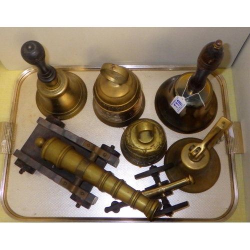 118 - A table top cannon, various brass bells etc   412780