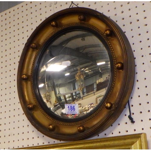 186 - An early to mid century convex mirror 34cm diameter