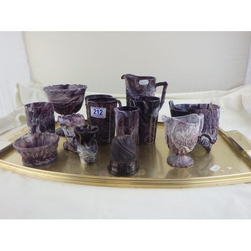 212 - A collection of north east purple slag glass