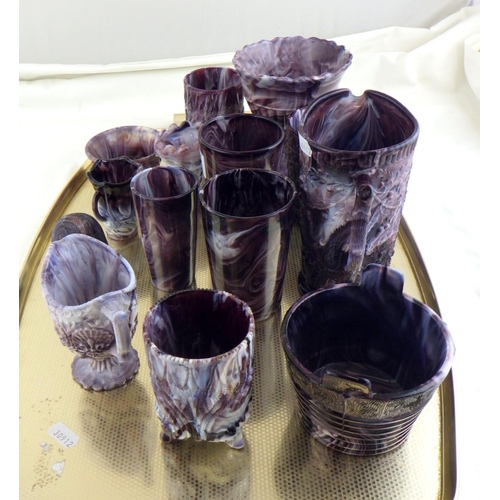 212 - A collection of north east purple slag glass