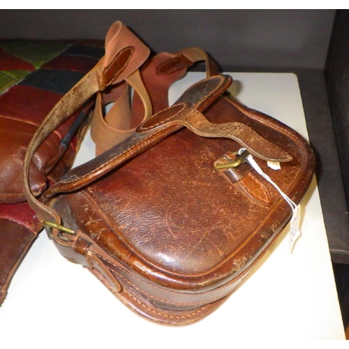 213 - A leather bag together with two leather pillows (3)