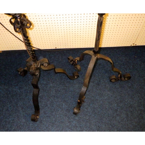 215 - Two wrought iron converted standard lamps