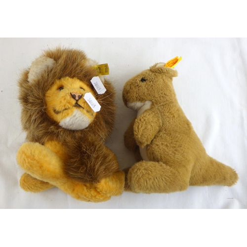 218 - A boxed Steiff rabbit together with a Steiff lion (2)