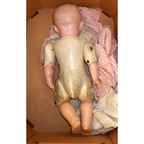 255 - A vintage jointed porcelain doll