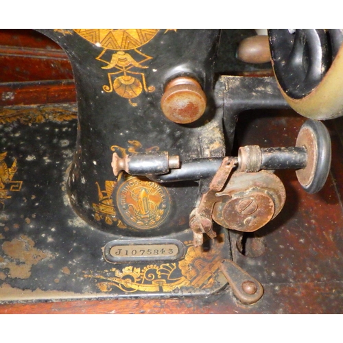 264 - A Cased table top Singer sewing machine