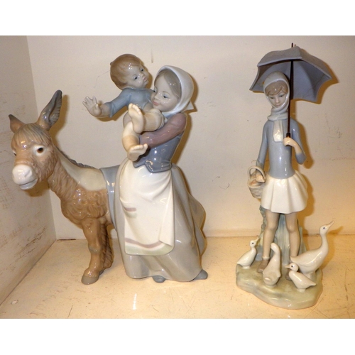 329 - A Group of four Lladro figure groups