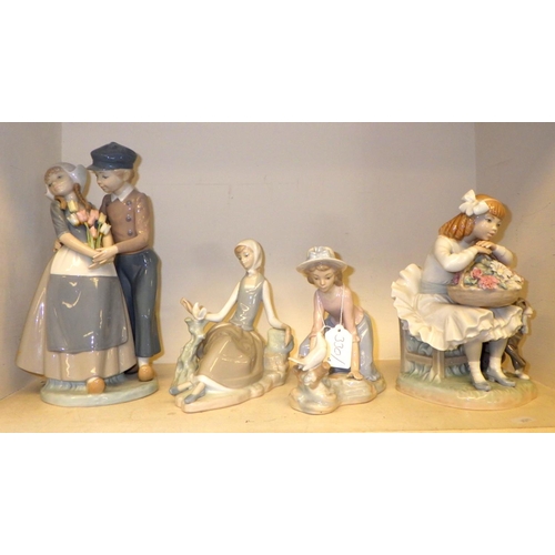 330 - A Group of eight Lladro figure groups all af (8)