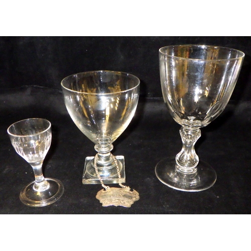 400 - A 19th C glass rummer together with two further stemmed glasses and a silver Gin bottle label