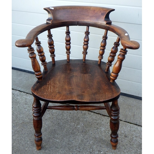 602 - A Victorian smokers bow chair, stamped A.M 226