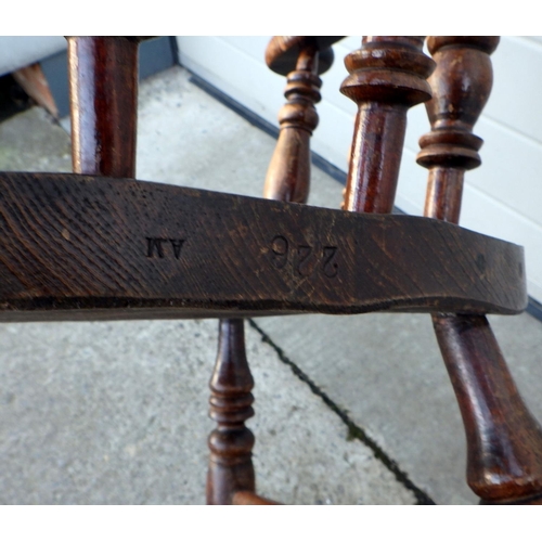 602 - A Victorian smokers bow chair, stamped A.M 226