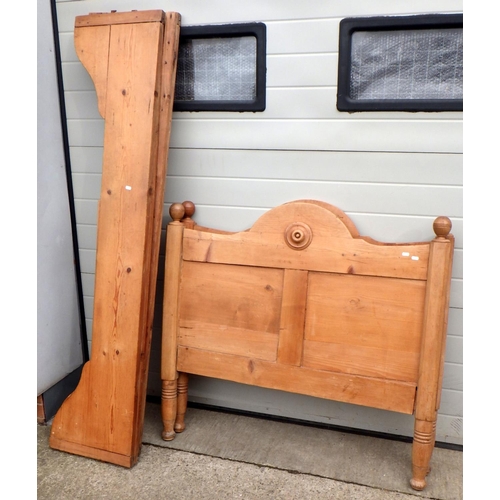 646 - A pine bed frame, missing one finial, 108cm wide