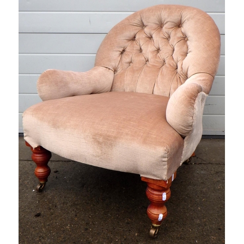 672 - A low button back chair