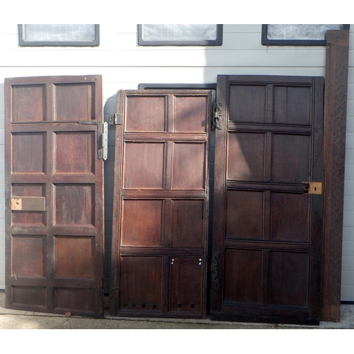 734 - Three panelled oak doors together with a blind fretwork  strip of wood, largest approx 183cm x 79cm ... 