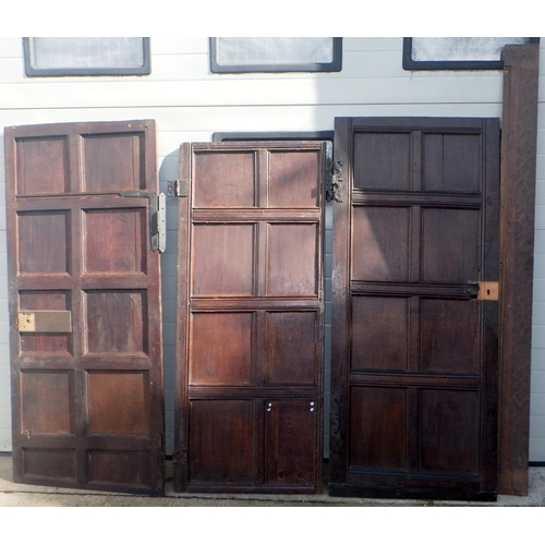 734 - Three panelled oak doors together with a blind fretwork  strip of wood, largest approx 183cm x 79cm ... 