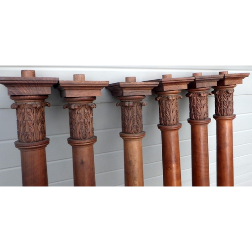 737 - A qty of assorted walnut panelling incl two long panels and six turned walnut columns, formerly part... 