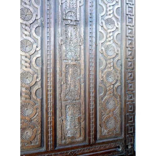 788 - Two similar carved panelled doors, 19th cen, old worm, 93cm x 216