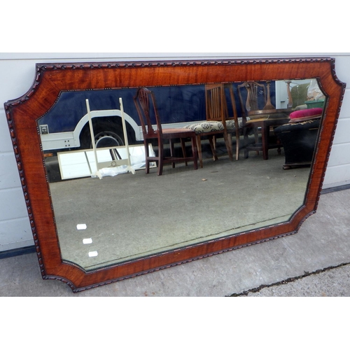 806 - An Edwardian mahogany framed wall mirror, 101cm wide