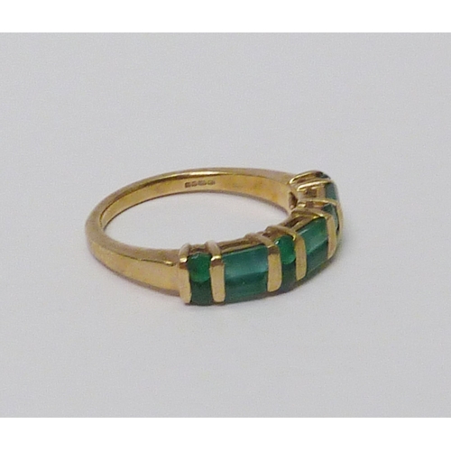 10 - A 9ct gold emerald dress ring.  A/F one stone lacking, chips and abrasions to stones.  Approximately... 