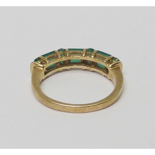 10 - A 9ct gold emerald dress ring.  A/F one stone lacking, chips and abrasions to stones.  Approximately... 