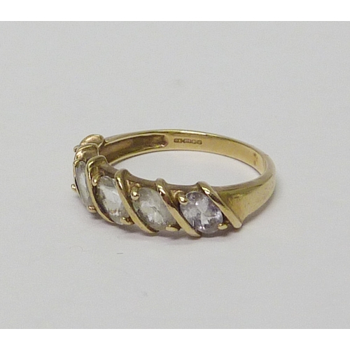 12 - A 9ct gold white sapphire five stone ring.  Approximately 2.5gr gross / size N.  736525