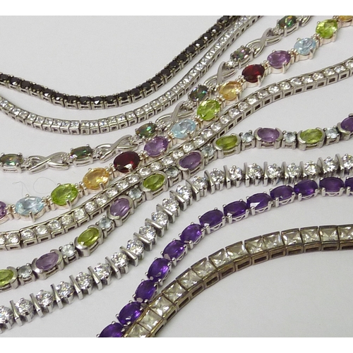 31 - Nine various stone set tennis bracelets incl white metal examples marked 925. 173799 and 391826