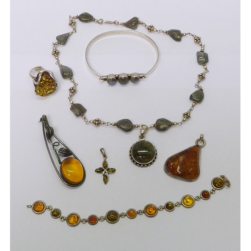 35 - Amber and white metal jewellery incl a ring and pendant; other white metal jewellery set with a Labr... 