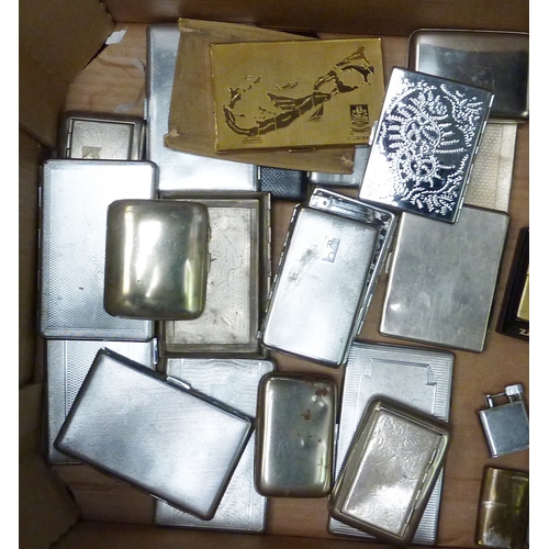 43 - A qty of cigarette lighters incl nine examples by Zippo; a qty  of base metal cigarette cases, 
 693... 